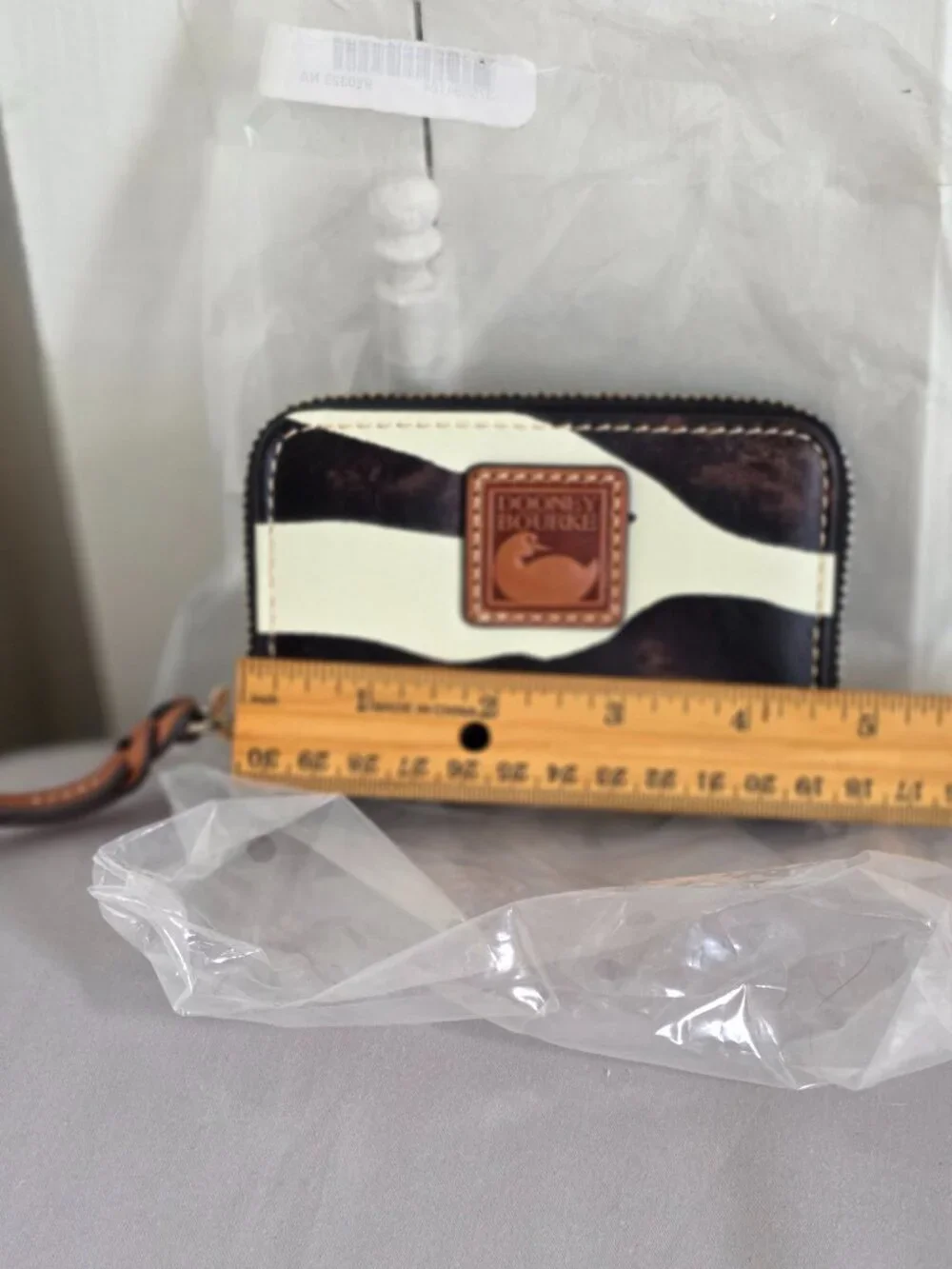 Dooney & Bourke zebra leather zip around
